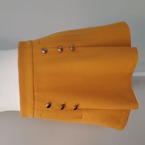 XOXO Mustard Yellow Pleasted A-Line Mini Skirt with Button and Pocket De…